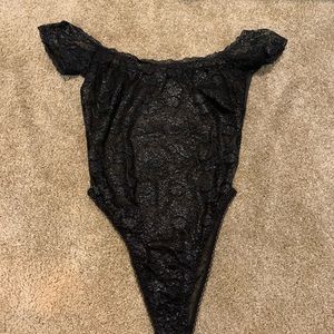 Lacy see through body suit